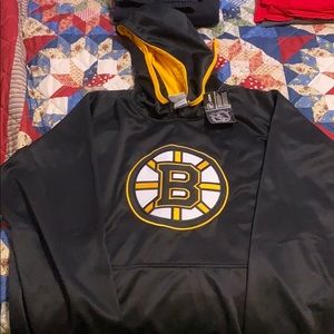 A Boston Bruins hoodie. New with tags. 2xl